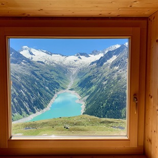 View from Olpererhütte mountain hut to Schlegeis reservoir, Zillertal